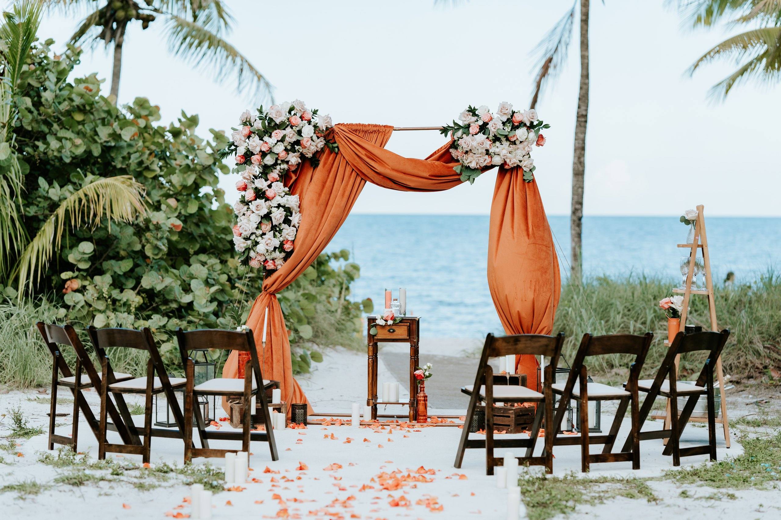 Two post arch with terracotta toned flowers