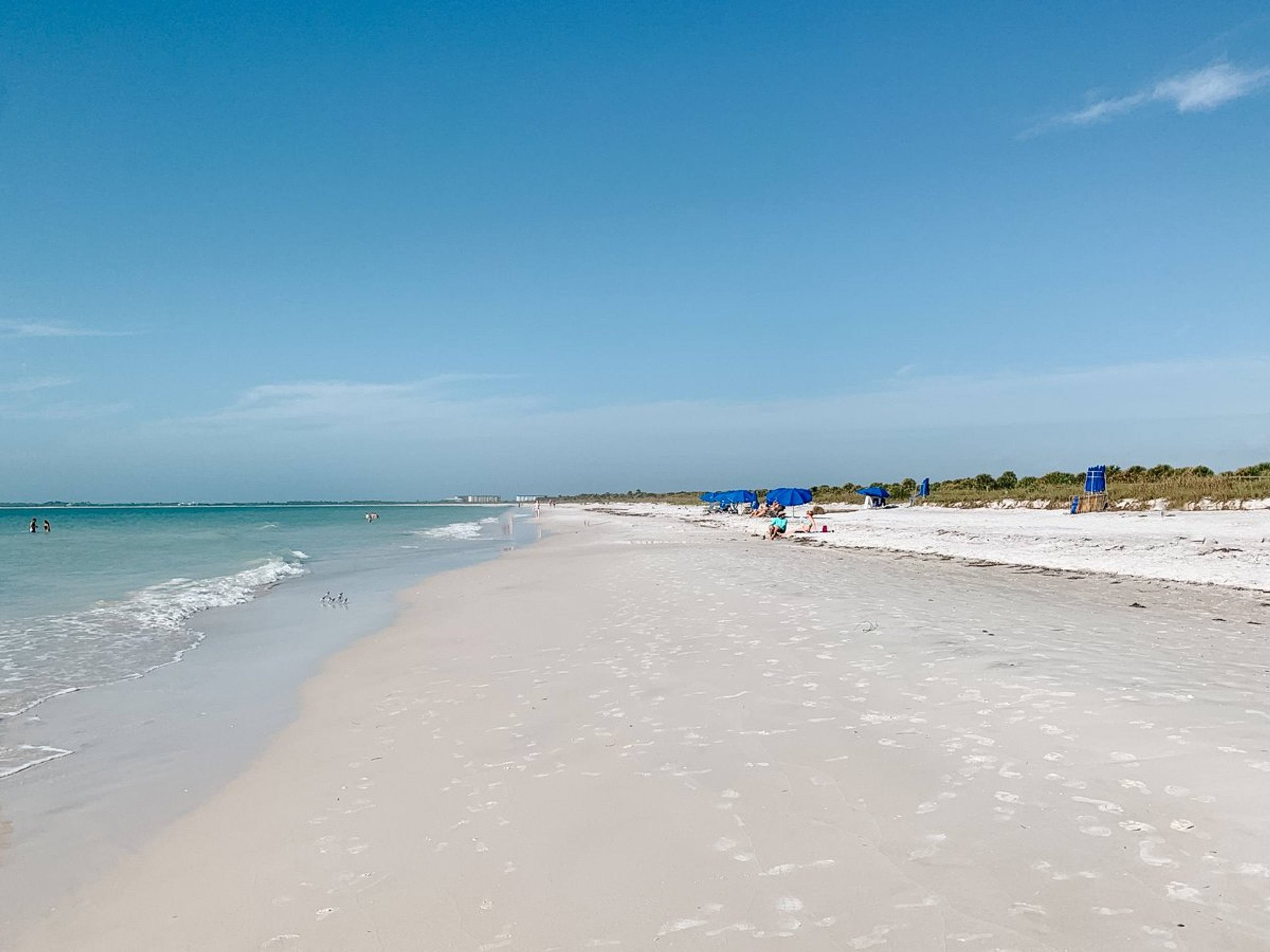 White sand shoreline and calm turquoise water