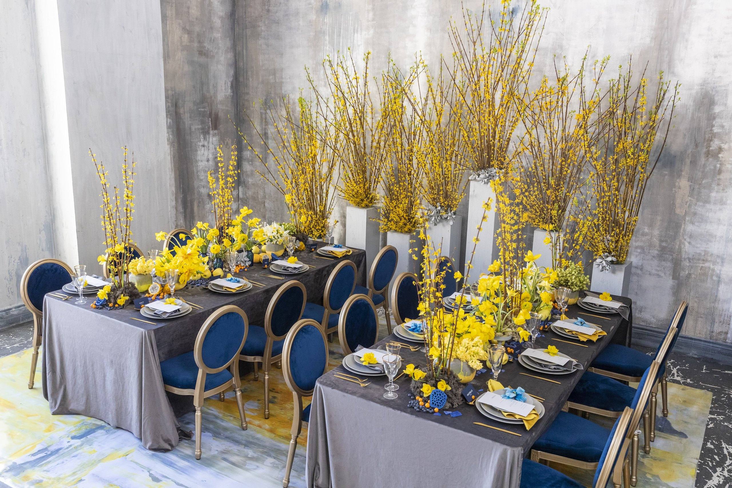 Banquet table styled with vivid yellow orchids