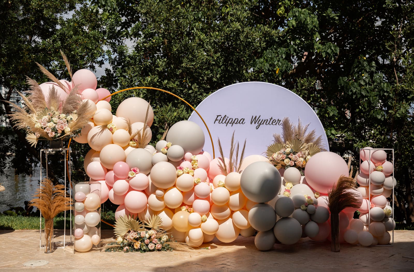 Balloon garland framing a party setup
