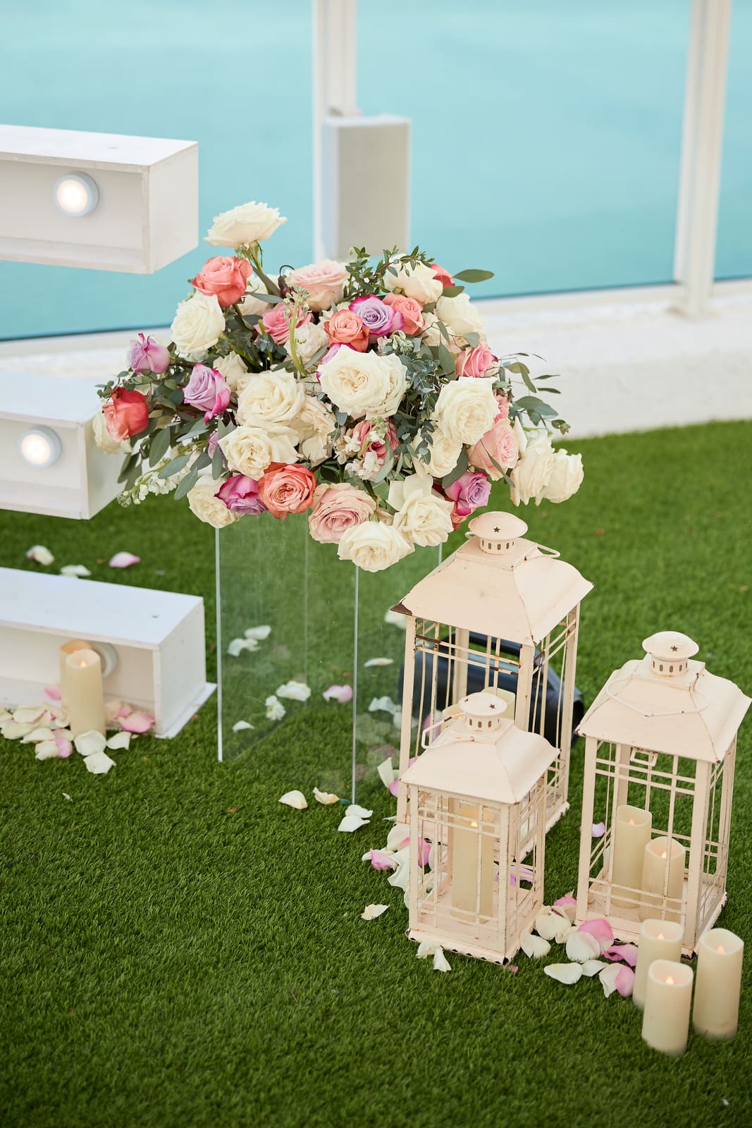 Pedestal flower arrangements set outdoors